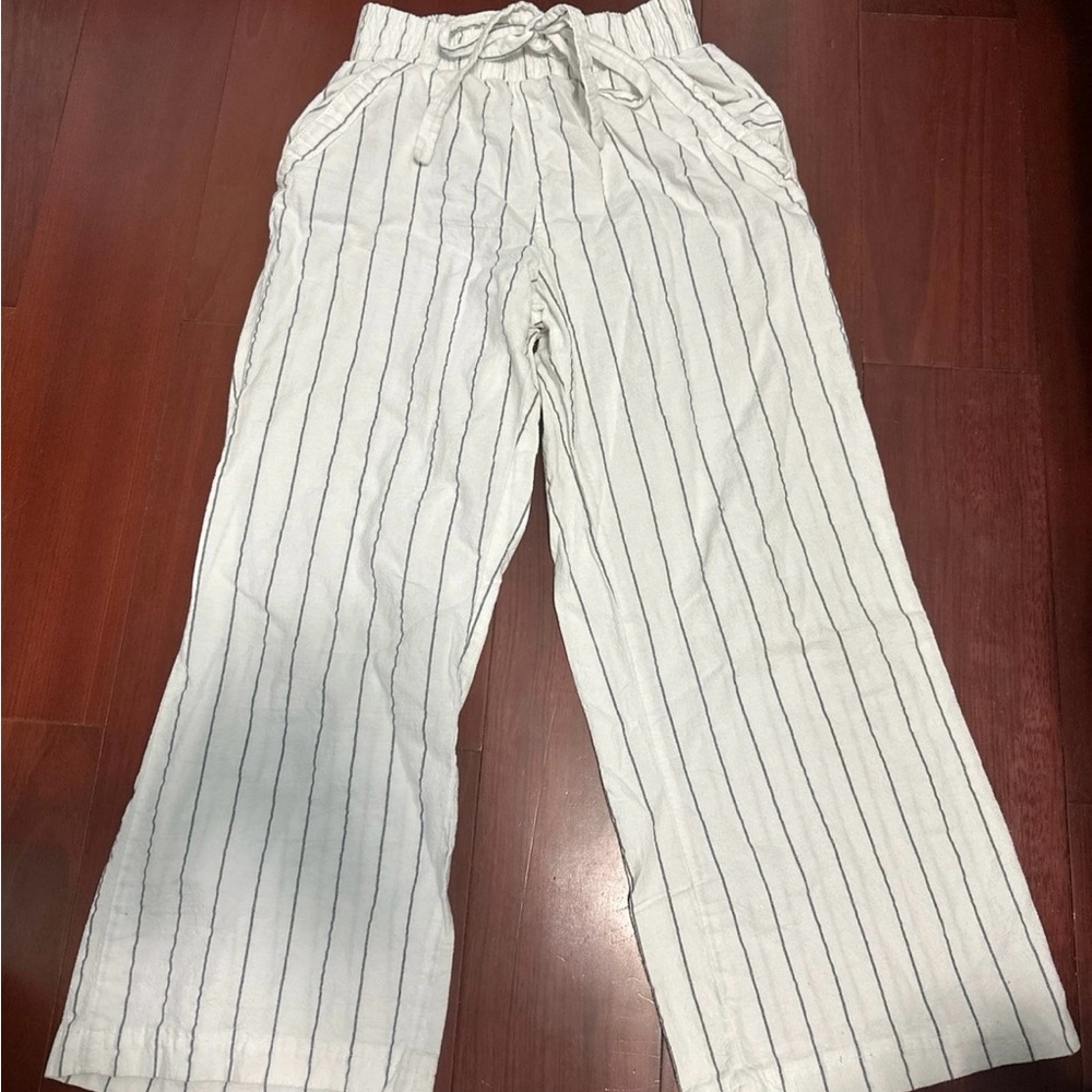 White pants with stripes